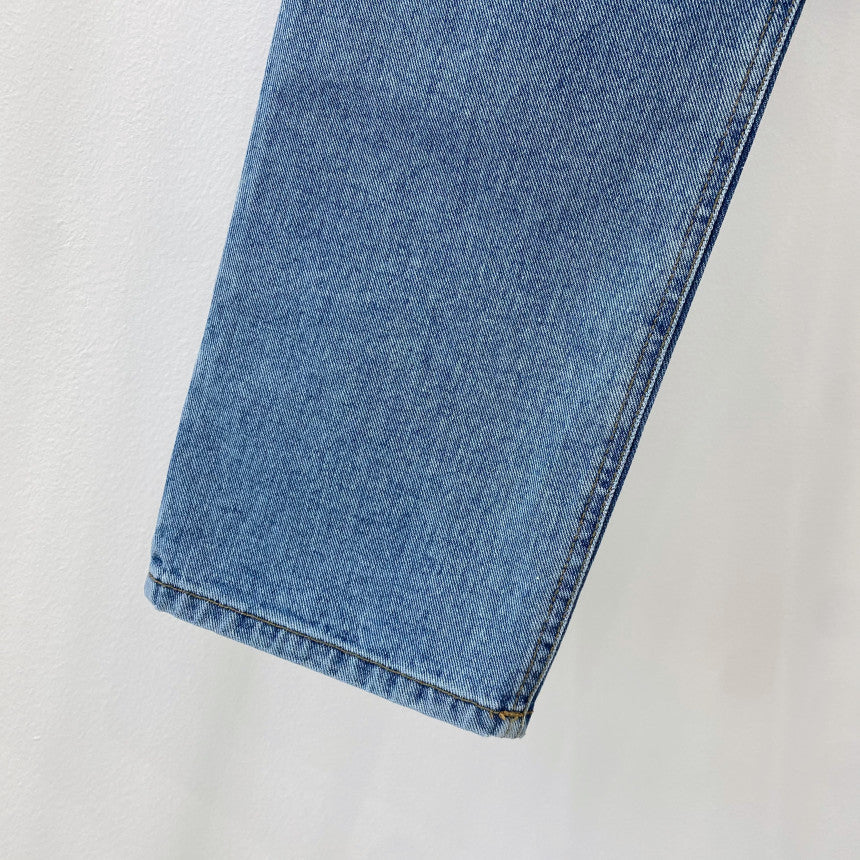 - Manhattan Straight-Leg Jeans