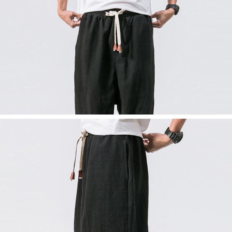 - Yoshika Loose-Fit Drawstring Trousers