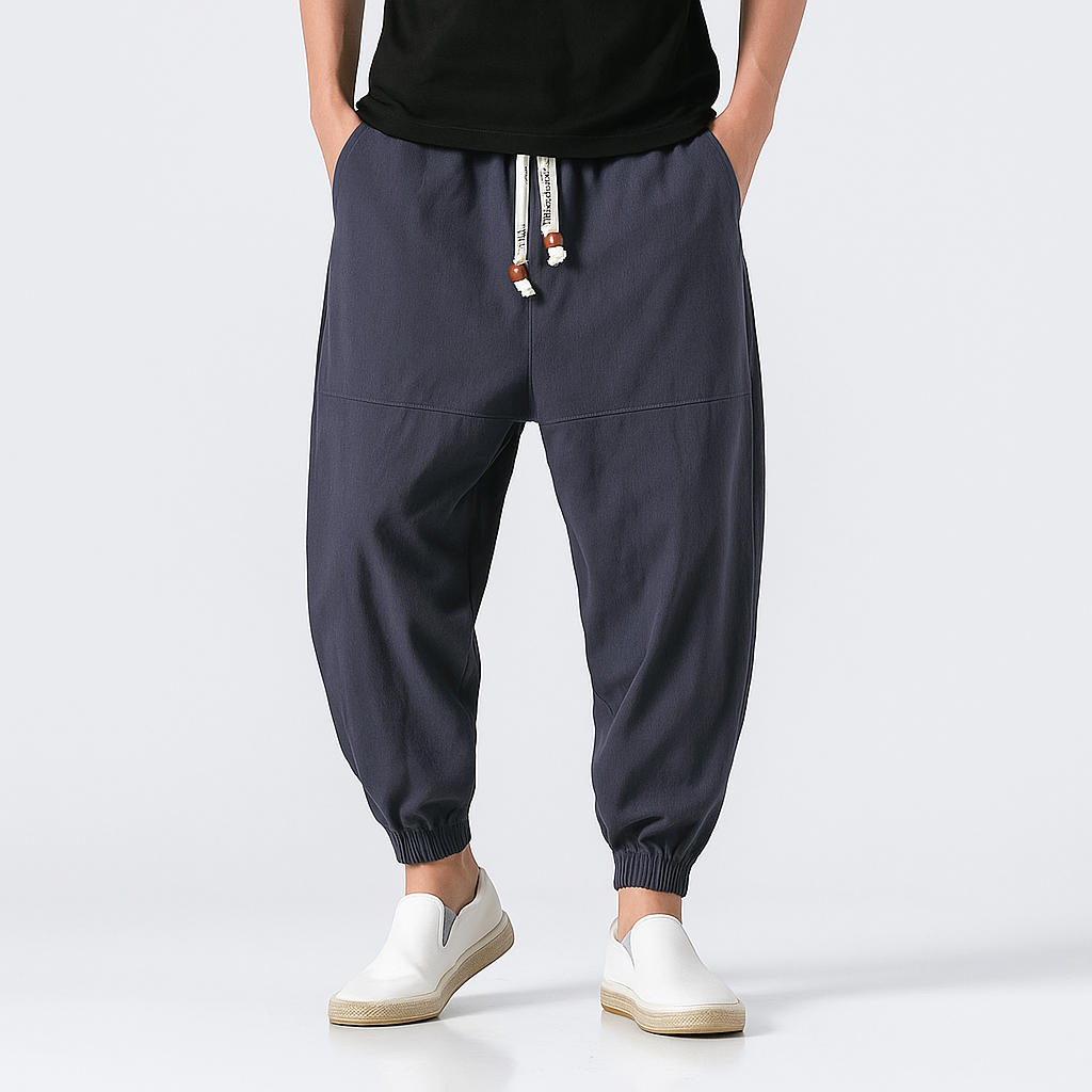 - Yoshika Loose-Fit Drawstring Trousers