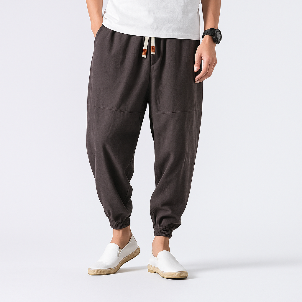 - Yoshika Loose-Fit Drawstring Trousers