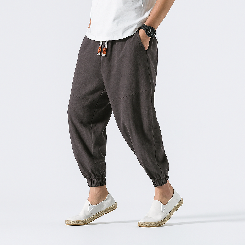 - Yoshika Loose-Fit Drawstring Trousers